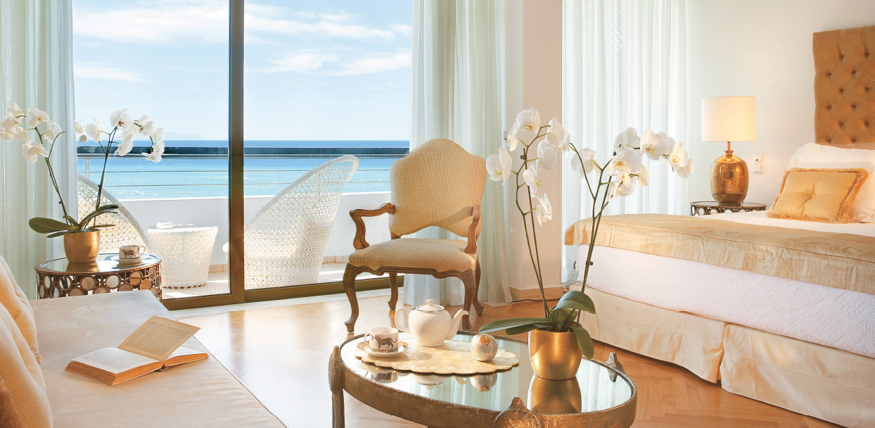 palace-guestroom-creta-palace-living-area-panoramic-sea-views