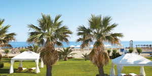 creta-palace-gardens-and-palms-in-luxury-resort-crete-greece